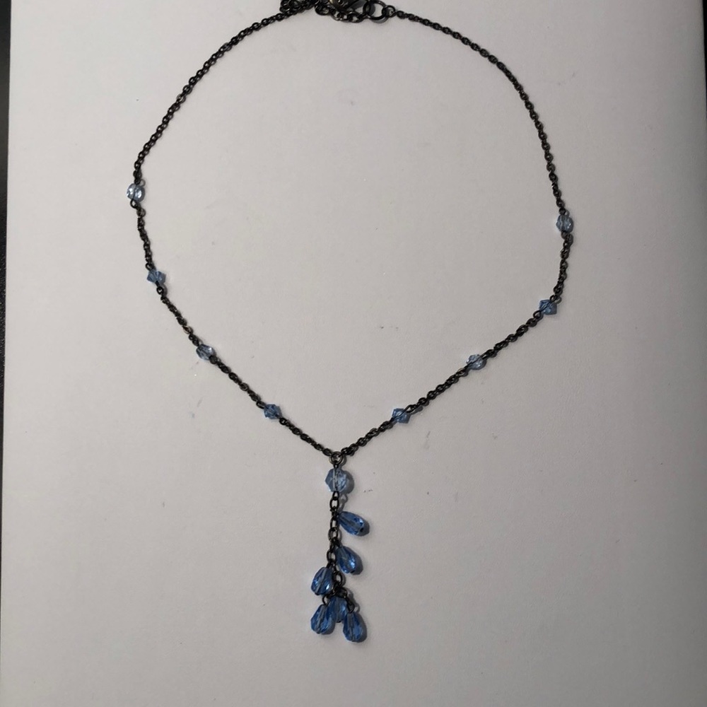 Black necklace with crystals.